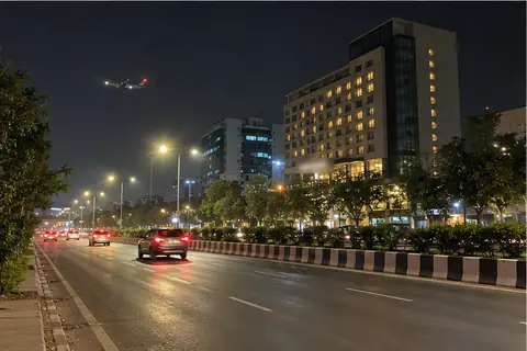 Viman Nagar in Pune at night, a plane coming in to land